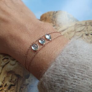 Bracelet double chaîne or rose topaze bleue