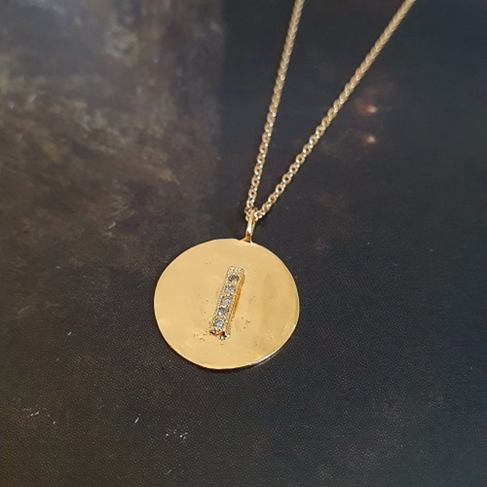 Collier médaille diamants
